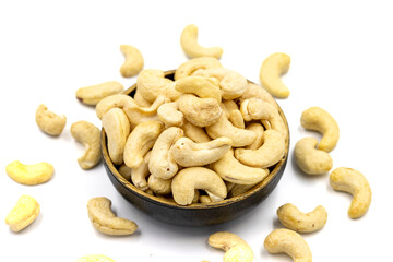 Cashew nuts isolated on white background. Organic nuts. close up