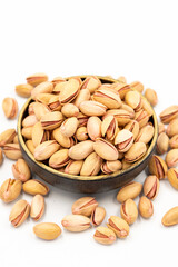 Pistachio nuts isolated on white background. Organic nuts. close up