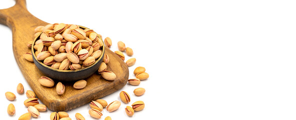 Pistachio nuts isolated on white background. Organic nuts. close up