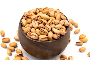 Pistachio nuts isolated on white background. Organic nuts. close up