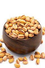 Pistachio nuts isolated on white background. Organic nuts. close up