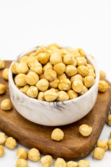 Roasted hazelnut nut isolated on white background. Organic nuts. close up