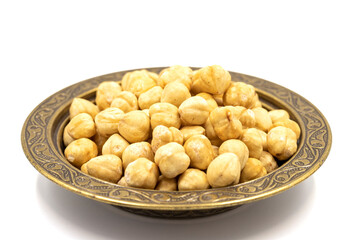 Roasted hazelnut nut isolated on white background. Organic nuts. close up