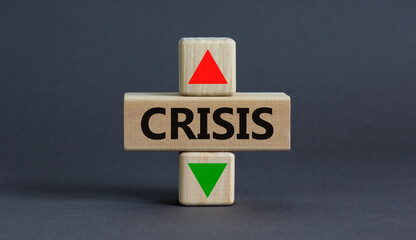 Time to crisis symbol. A wooden cubes with up icon. Wooden cubes with the concept word Crisis. Beautiful grey table grey background. Business and crisis time concept. Copy space.