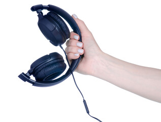Black modern headphones in hand on white background isolation
