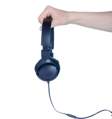 Black modern headphones in hand on white background isolation