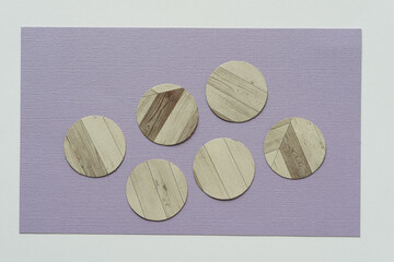 paper discs with pattern arranged on a paper background