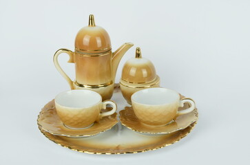 Vintage porcelain coffee set on a tray