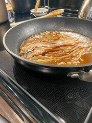 Caramel cooking in a pan