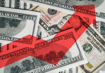 A bright red arrow on the background of money shows the direction up. The concept of changing the...