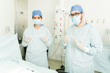 Portrait of two surgeons ready for surgery