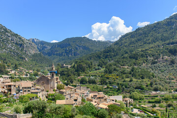 Fototapeta na wymiar View of Valldemossa, Mallorca, Spain. Village in the valley surrounded by mountains.