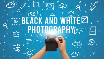 Hand taking picture with digital camera