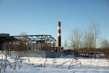 Obraz premium Industrial type. Landscape with trumpet. Industrial zone in winter.