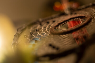 Dreamcatcher in interior. Details of Indian amulet for good sleep. Object woven from threads....