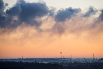 Beautiful sunrise. 
Industrial view. Pastel colours