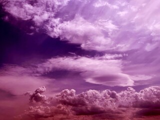 Surreal sky and purple clouds background. Fantastic heaven cloudscape.