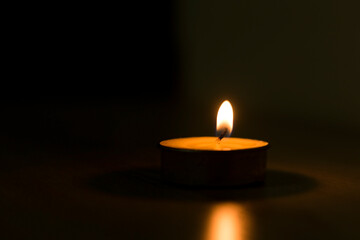 Lit candles for dinner in the dark, burning candles	