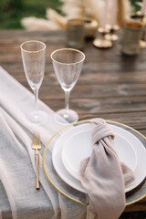 Boho wedding table set. vintage dining table with decorations, flowers and pampas grass  Boho style. Table set for an event, party, date or wedding.