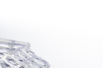 Empty pack of pills isolated on white background. Empty pill package