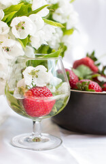 Red strawberries in a glass. Harvesting berries