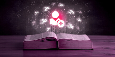 Open book with social networking icons above