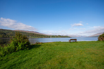 Fototapeta na wymiar Bench with a view - overlooking Loch Eil, Scotland