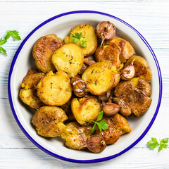 Crispy smashed baked potatoes. Top view, copy space.
