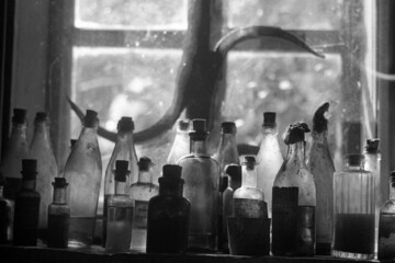 Row of medicine pills bottles
