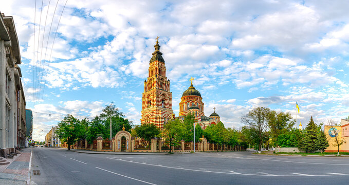Kharkiv, Ukraine - Spring 2022: One of the largest cathedrals in Eastern Europe - Cathedral of the Annunciation of the Blessed Virgin Mary in Kharkiv. Evening photo. Panoramic shot.