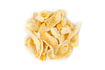 Freeze dried mango slices in a heap isolated over white. Top down view
