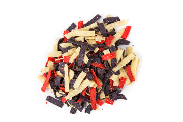 Festive colored tortilla chip strips in red white and blue. Top down view