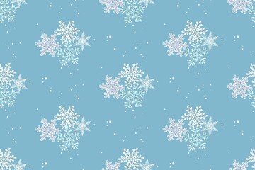 Fototapeta na wymiar Winter seamless pattern. Snowflakes on a blue background. Vector.