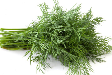 Bunch of green dill isolated on white background. Fresh herbs seasoning for food