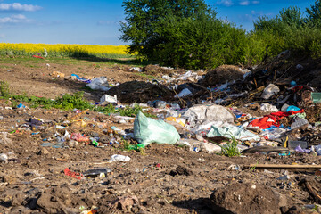 Garbage dump in the open air outside the city.