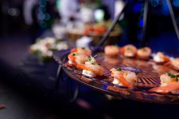 shrimp canape with soft cheese close-up on the buffet