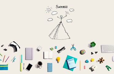 Standing on the top of a mountain with collection of electronic gadgets and office supplies