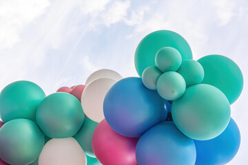 a balloon decoration with blue sky