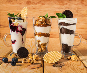 cream cheese desserts with berries, caramel and cookies