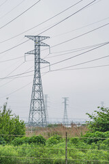 Power lines reflecting in water, city park, industrial, power theme, textured backgrounds.
