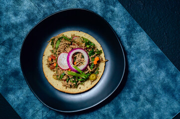 Beef salpicon. Mexican spicy beef steak salad and tostadas