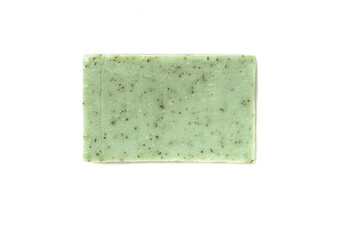 Herbal soap bar isolated on white, top view