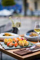 sushi and white wine outdoor