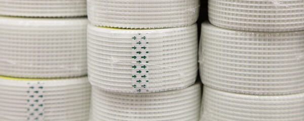 A many net stripe adhesive construction tapes for plaster sealing seams in ceiling building