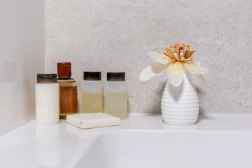 Cosmetics on the edge of the sink. - 506137974