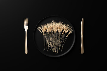 a plate with wheat on a black background, next to a golden fork and knife, 3d rendering. the concept of hunger and deprivation, problems with the supply of crops