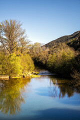 Fototapeta na wymiar River Virdoule on a sunny spring afternoon near Sauve, Gard, South of France