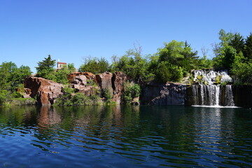 Rock formation, waterfalls, and pond at Daggett Memorial Park in Montello, Wisconsin