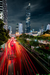 Fototapeta premium Bangkok skyline with light trails