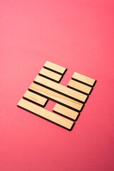 Gene Key 55 wood hexagram i ching on pink background